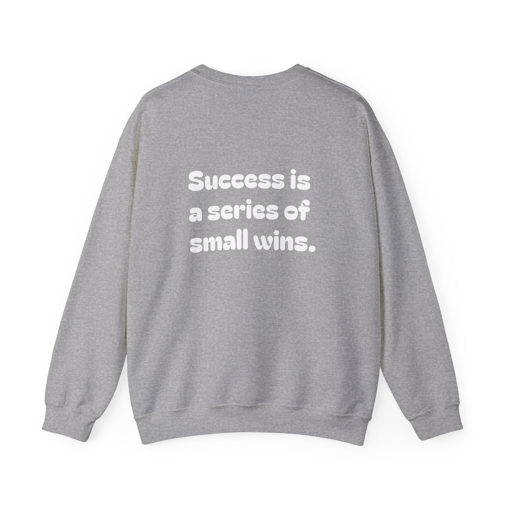 Crewneck Sweatshirt — "Success is a Series of Small Wins" Inspirational Pullover ("Different doesn't mean wrong" chest text)
