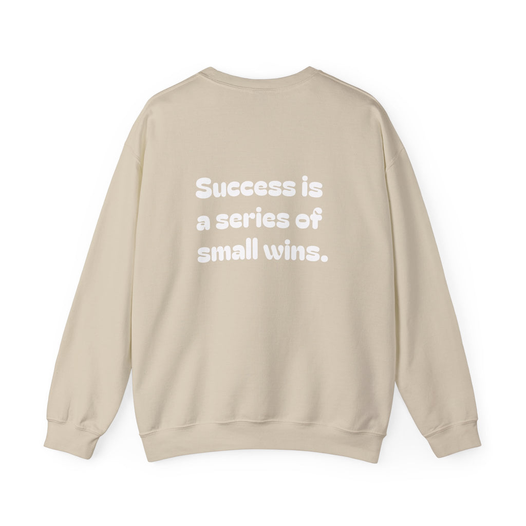 Crewneck Sweatshirt — "Success is a Series of Small Wins" Inspirational Pullover ("Different doesn't mean wrong" chest text)